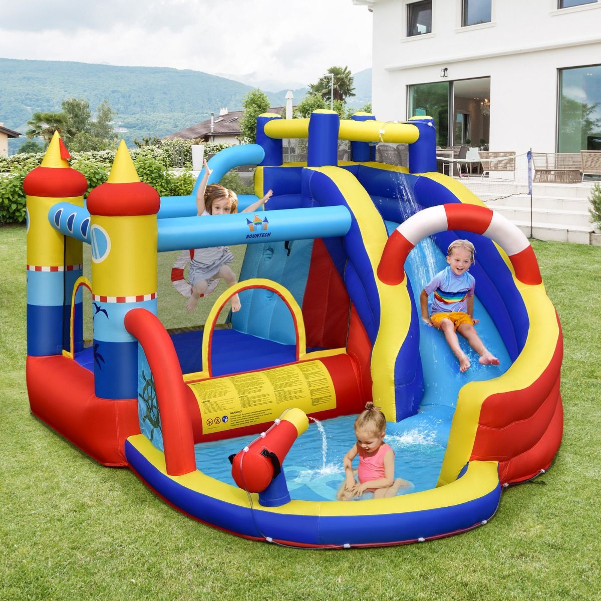 Boat Style Inflatable Castle with Curved Slide Jumping Zone Climbing Wall with 450 W Inflator -